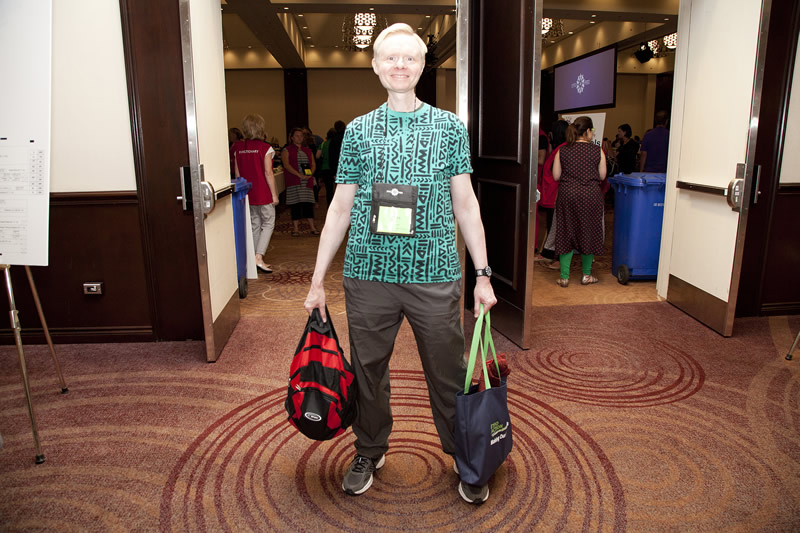 A delegate arriving at Annual Meeting